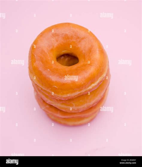 Simple Glazed Donuts Stock Photo - Alamy