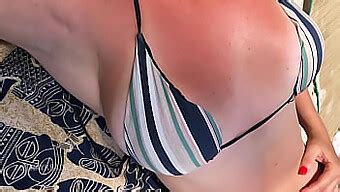 Amateur MILF In A Micro Bikini On The Beach
