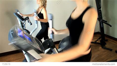 Beautiful Blonde Girls Enjoy Working Out At The Gym Stock Video Footage