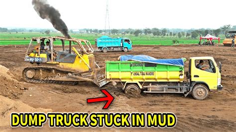 Dump Truck Stuck In Mud Recovery By Komatsu D85ESS Dozer L Pushing Mud