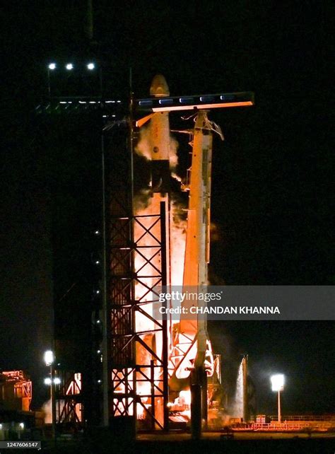 The Spacex Falcon 9 Rocket With The Companys Crew Dragon Spacecraft