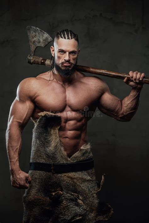 Viking With Huge Biceps And Naked Torso Posing With Axe Stock Image