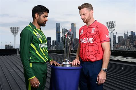 Jos Buttler And Babar Azam Pose With The Trophy On The Eve Of The Final