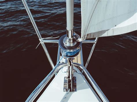 Free Stock Photo Of Sailboat S Bow Cutting Through Calm Blue Water