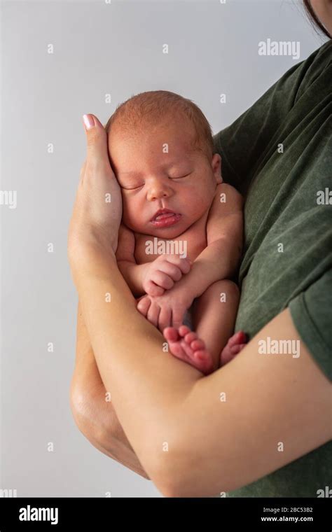 Beautiful New Born Baby Resting On Mom S Hands Stock Photo Alamy