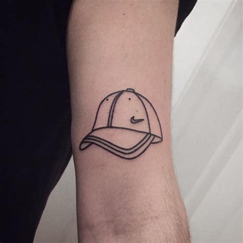 Nike cap tattoo by @themagicrosa - Tattoogrid.net