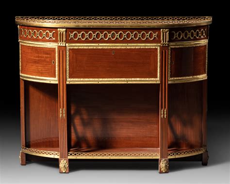 A Louis Xvi Gilt Bronze Mounted Mahogany Veneered Console Secr Taire