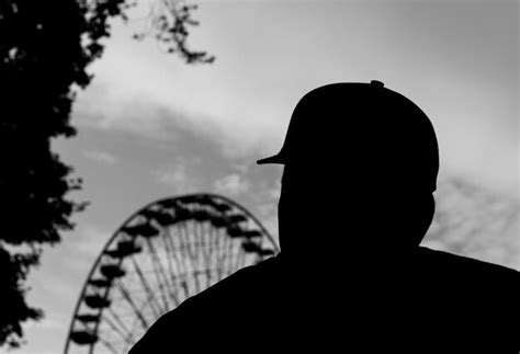 Premium Photo Rear View Of Silhouette Person At Amusement Park