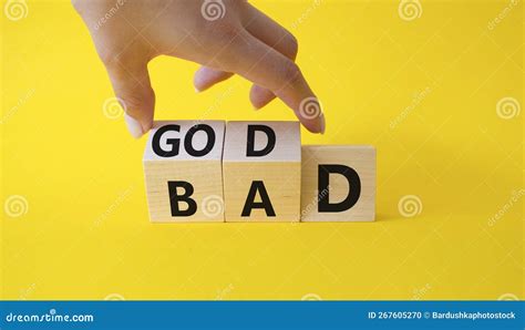 Good Vs Bad Symbol Businessman Hand Turns Cubes And Changes Word Bad