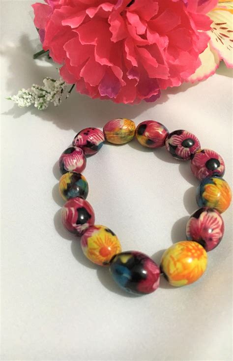 Hawaiian Floral Ceramic Bead Bracelet Yellow Blue Pink Etsy Ceramic