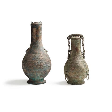 Bonhams Two Archaic Cast Bronze Covered Vessels Hu Warring States