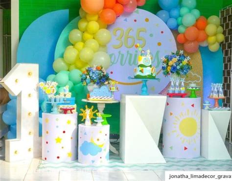 A Birthday Party With Balloons And Decorations