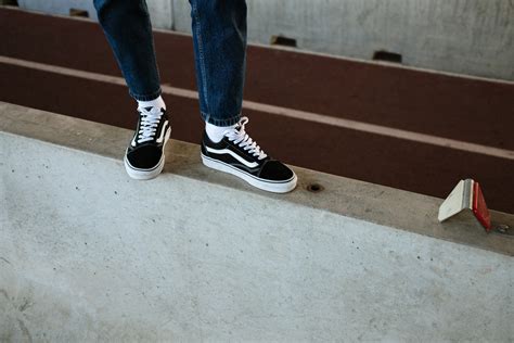 Person Walking Wearing Black Shoes In Grayscale Photography · Free