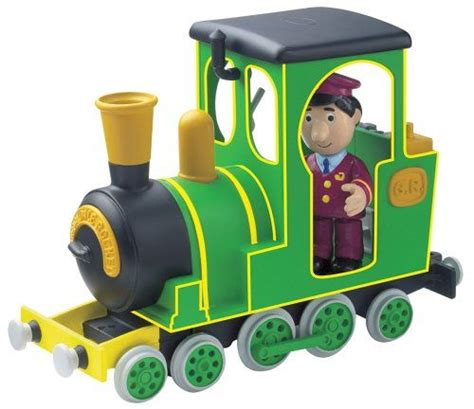 A Green And Yellow Toy Train With A Man In Uniform On It S Side