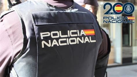 Hallan un cadáver en un local de Granada donde vivía una mujer con