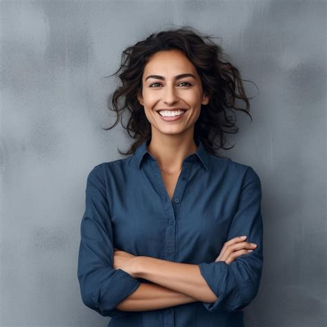 Premium Ai Image A Woman With Her Arms Crossed And A Smile On Her Face