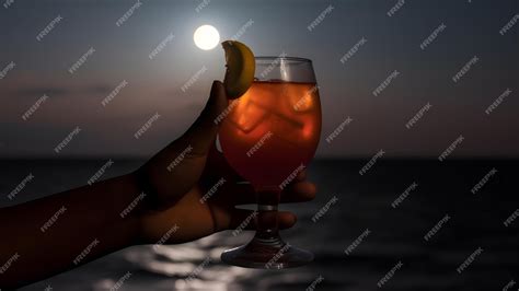 Premium Ai Image African American Hand Holding Glass Of Cocktail On