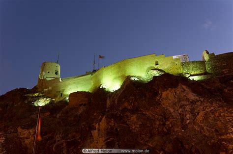 Muttrah fort at night photo. Muttrah, Muscat, Oman