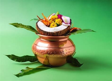 Premium Photo Copper Kalash With Coconut And Mango Leaf With Floral