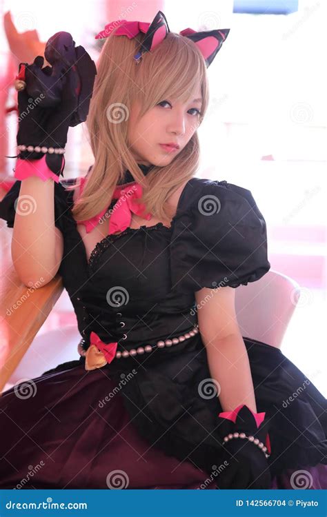 Japan Anime Cosplay Portrait Of Girl Cosplay In Pink Room Background