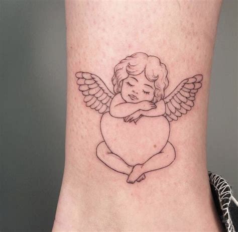 Small Angel Heart Tattoo On Leg