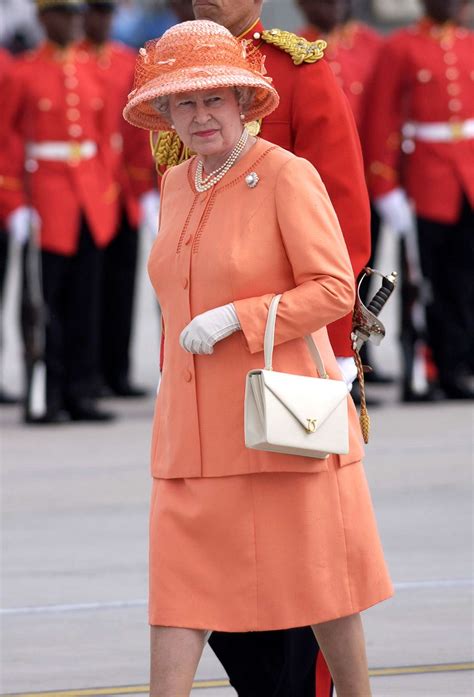 Queen Elizabeths Best Outfits Her Most Iconic Looks Of All Time