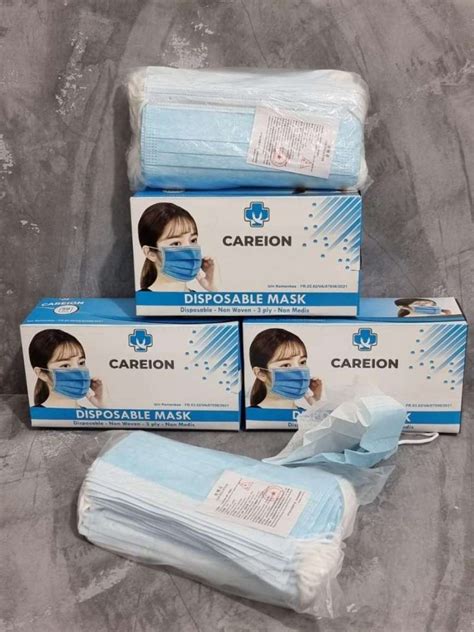 Jual MASKER 3PLY EARLOOP BIRU CAREION ISI 50 PCS PERBOX Di Seller