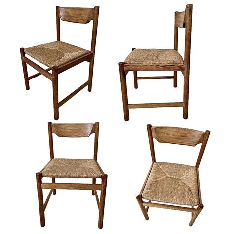 Set Of Four Pine Wood And Cane Woven Dining Room Chairs 1970s 240545