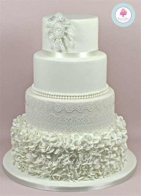 Camilla Ruffles Pearls And Lace Wedding Cake Cakesdecor