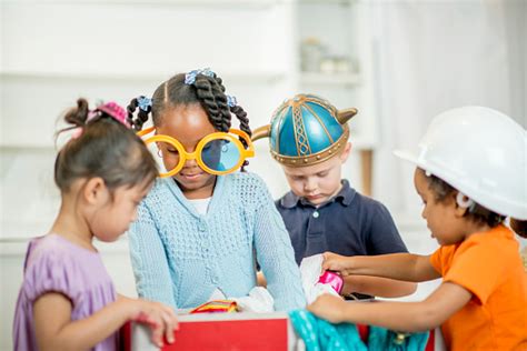 Children Playing Dress Up Together Stock Photo - Download Image Now ...