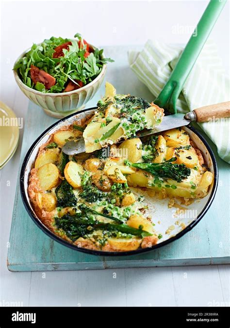 Frittata With Potatoes And Broccoli Stock Photo Alamy