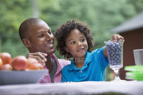 Father And Son On Picnic On The Farm Natural Beauty Son Parent