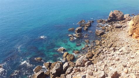 At The Edge Of The Portuguese Coast Stock Photo Image Of Algarvebeach