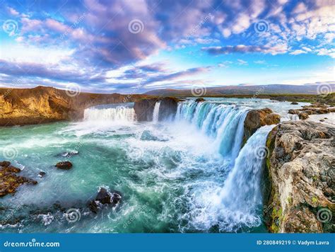 Breathtaking Sunset Scene Of Powerful Godafoss Waterfall Dramatic Sky