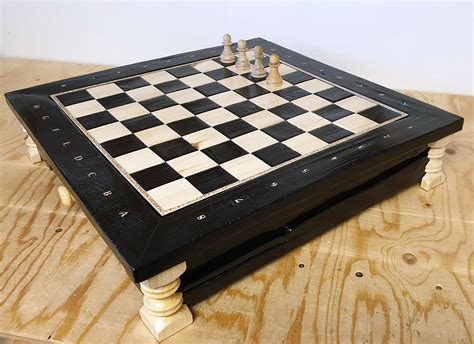 I finished this burnt wood chess board. Now I only need to make 28 ...