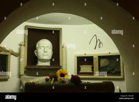 Tomb of Italian Fascist dictator Benito Mussolini in the Mussolini family crypt in the cemetery ...