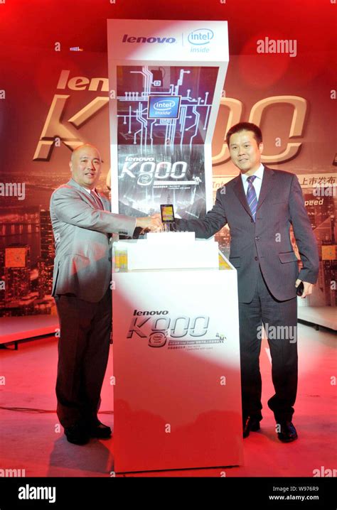 Chen Xudong Right Senior Vice President Of Lenovo Shakes Hands With