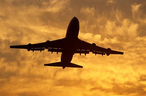 Boeing 747 400 Climbing Out In Sunset Photograph By Austin Brown