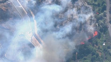 News Update Evacuation Levels Lowered After Brush Fire Breaks Out In