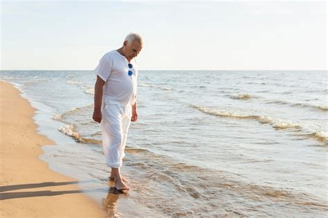 Free Photo Older Man Outdoors Enjoying The Beach