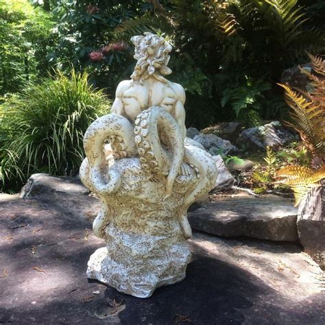 Homestyles In Antique White Octoman Male Mermaid Sitting On Coastal