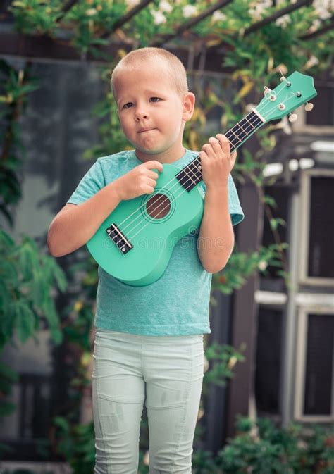 Portrait Of A Cute Boy With Ukulele Stock Image Image Of Lifestyle