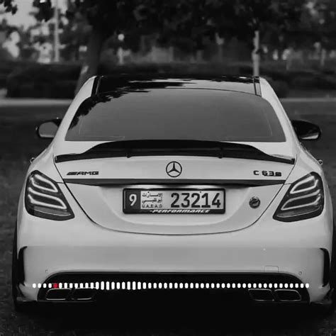 The Back End Of A White Mercedes Benz Car