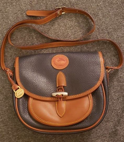 Vintage Dooney And Bourke Leather Crossbody Purse With Adjustible