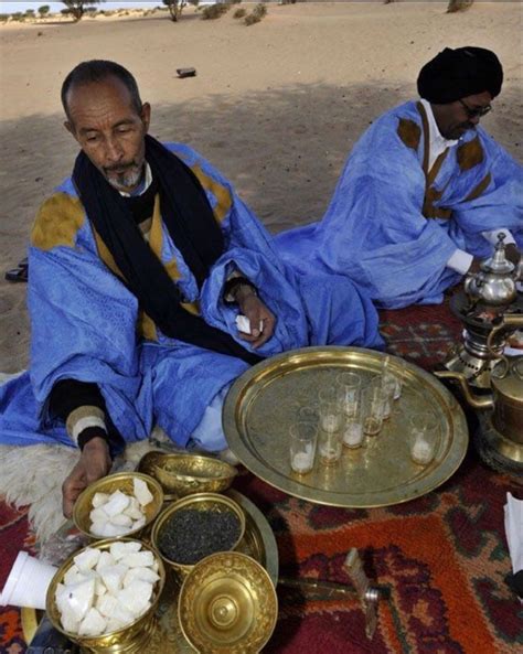 Moroccan Sahrawi men performing traditional tea ceremony in 2022 ...