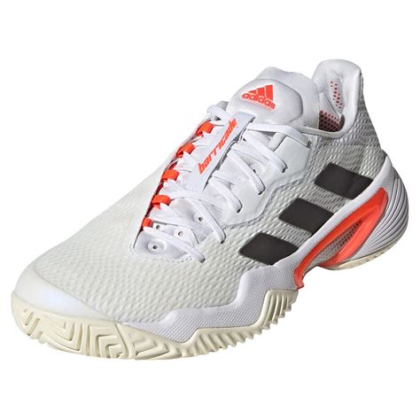 **Unleash Your Ace with adidas Barricade Womens Tennis Shoes: A Symphony of Power and Grace**