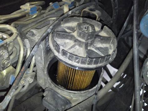 2004 dodge ram diesel fuel filter location 