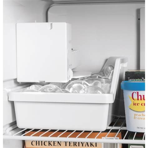 Stylish and Efficient: Elevate Your Kitchen with a White Top Freezer Refrigerator with Ice Maker