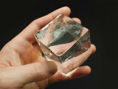 The Big Ice Cube: A Colossal Crystal with Crystalline Secrets