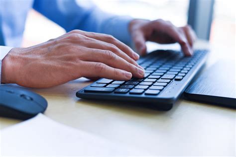 a guy computer typing keyboard, Close up of typing male hand on keyboard concept